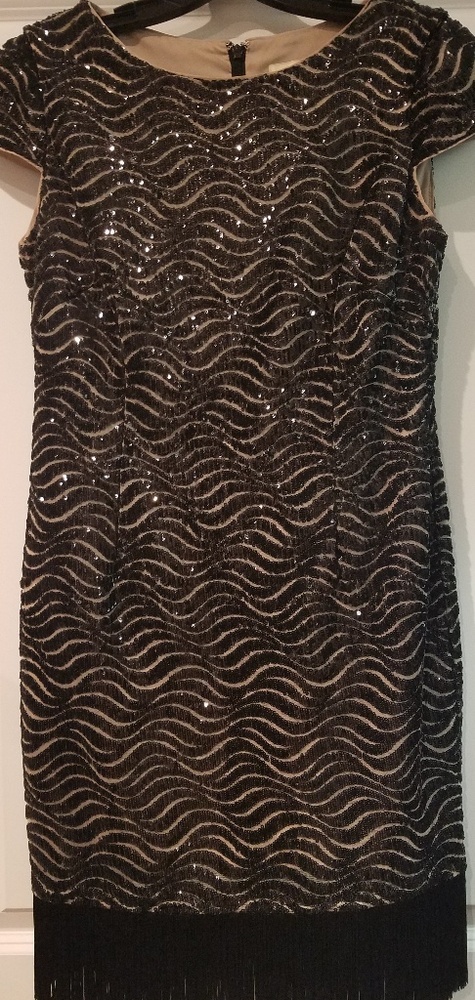 Black sequined knee length dress